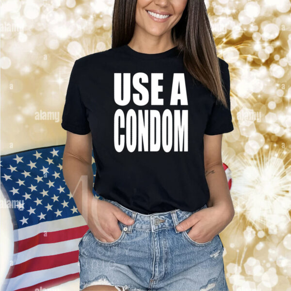 Rihanna’s USE A Condom Shirt