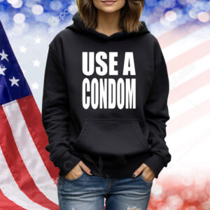 Rihanna’s USE A Condom Shirt